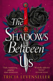 Front cover of the book 'The Shadows Between Us (International Edition)' by Levenseller, Tricia.