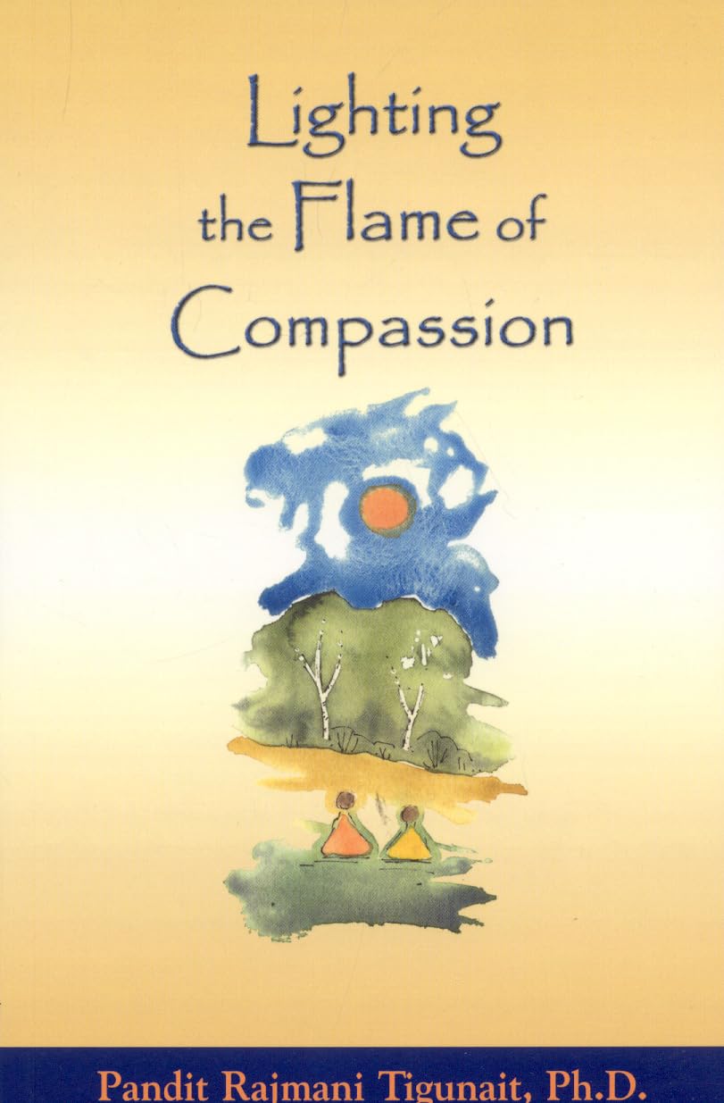 Front cover of the book 'Lighting the Flame of Compassion' by Tigunait Rajmani.