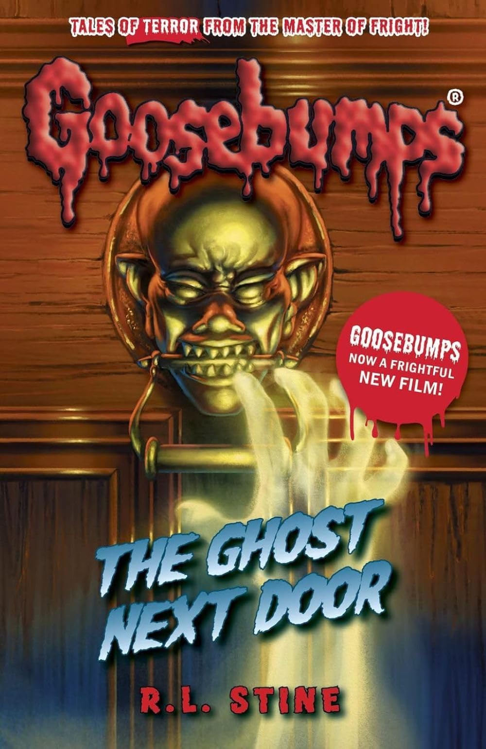 Front cover of the book 'The Ghost Next Door (Goosebumps)' by R.l Stine.