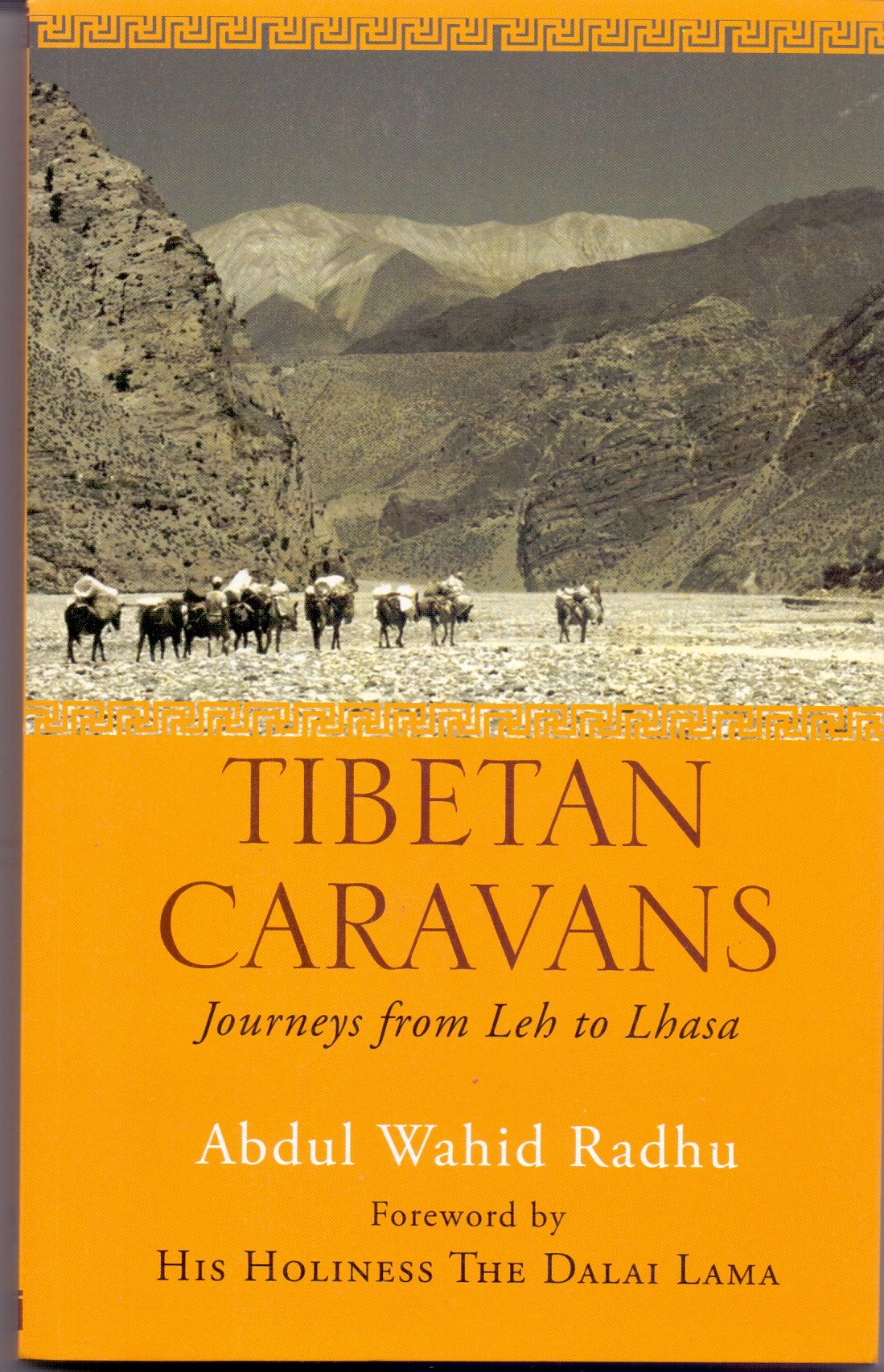 Front cover of the Paperback book 'Tibetan Caravans : Journeys from Leh to Lhasa Abdul Wahid Radhu and His Holiness The Dalai La' by Abdul Wahid Radhu.