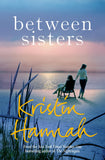Front cover of the book 'Between Sisters Hannah, Kristin' by Kristin Hannah.