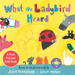 Front cover of the Board Book book 'What the Ladybird Heard: A Push, Pull and Slide Board Book' by Julia Donaldson.