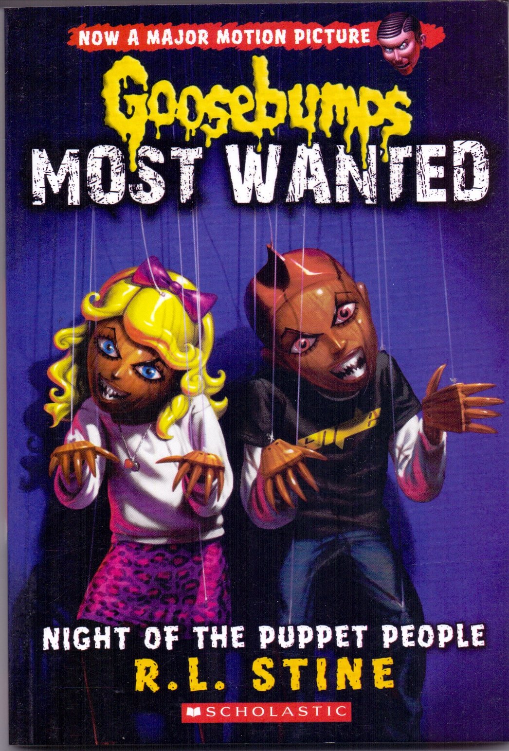 Front cover of the Paperback book 'Goosebumps Most Wanted #8: Night of the Puppet People NILL' by R.l Stine.